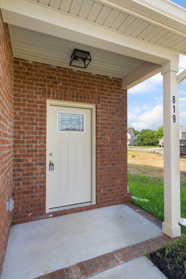 doorway to property featuring a patio