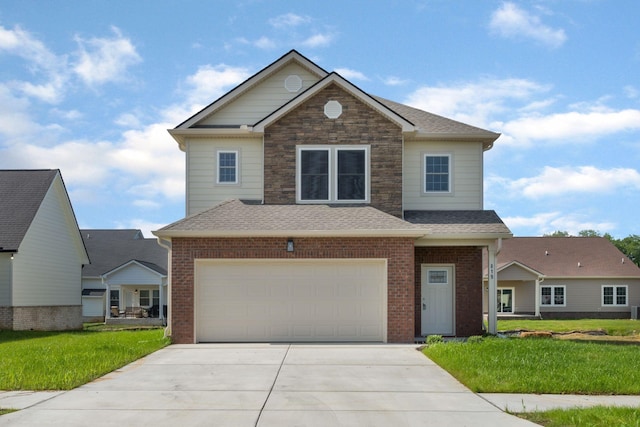 front facade featuring a garage and a front lawn