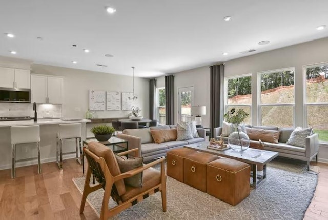 living room featuring light wood-type flooring