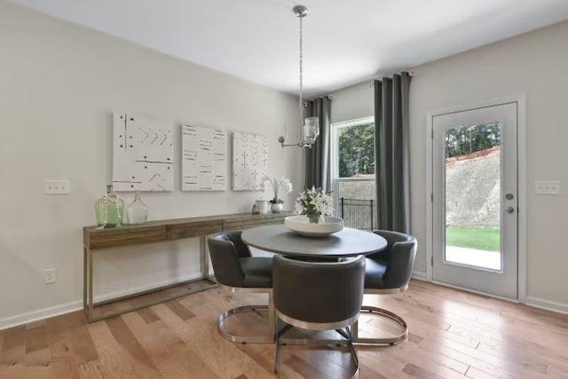 dining space featuring light hardwood / wood-style floors