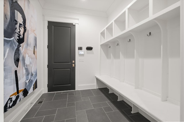 mudroom with crown molding