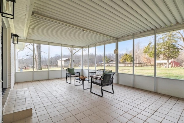 unfurnished sunroom with a healthy amount of sunlight