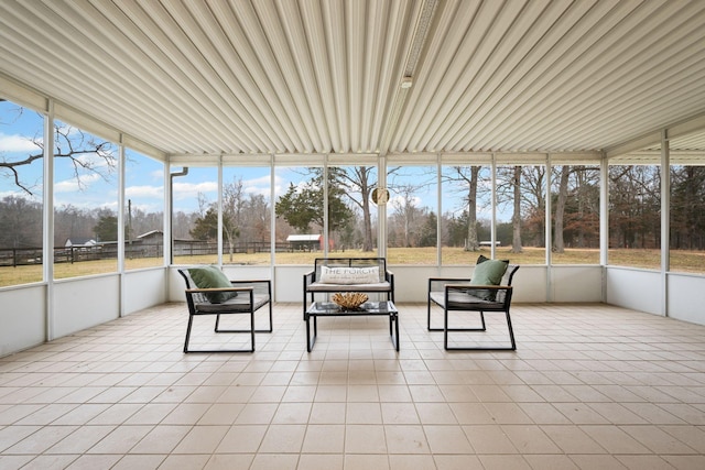 unfurnished sunroom with a wealth of natural light