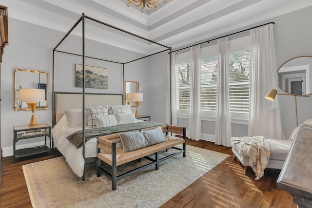 bedroom with dark wood-type flooring