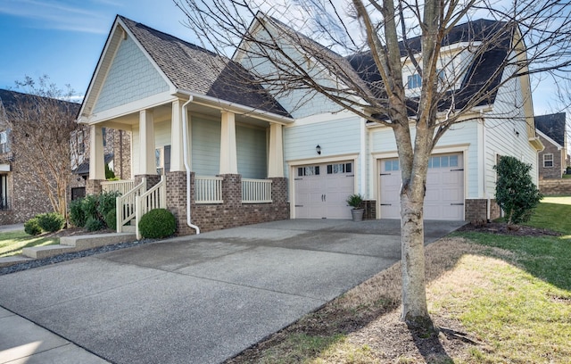 view of front facade featuring a garage and a porch