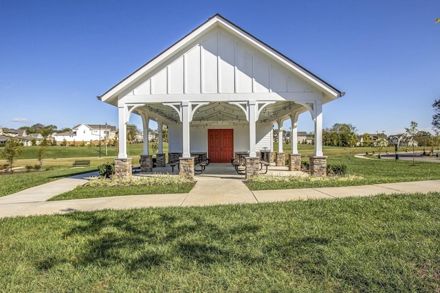 view of property's community with a yard