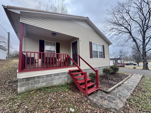 view of front of home featuring covered porch