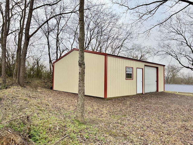 view of outbuilding featuring a garage