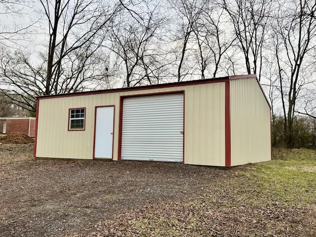 view of outdoor structure with a garage