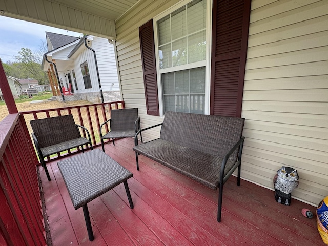 wooden terrace featuring a porch