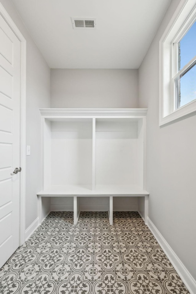 mudroom with visible vents and baseboards