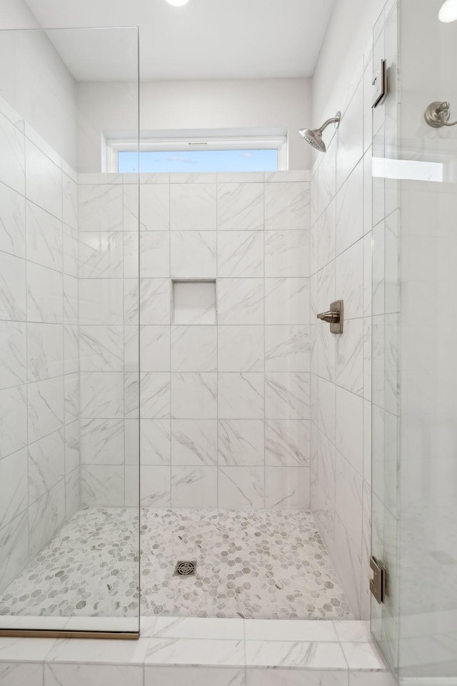 bathroom featuring walk in shower