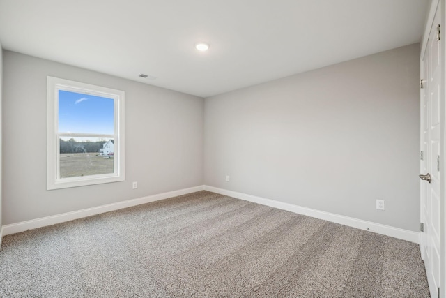 view of carpeted spare room