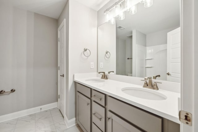 bathroom featuring vanity and walk in shower