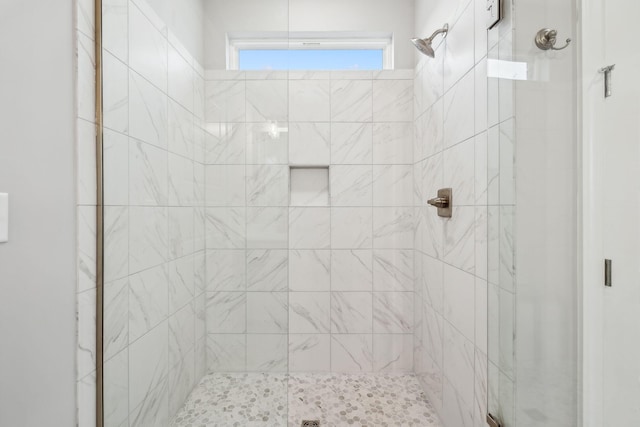 bathroom featuring walk in shower