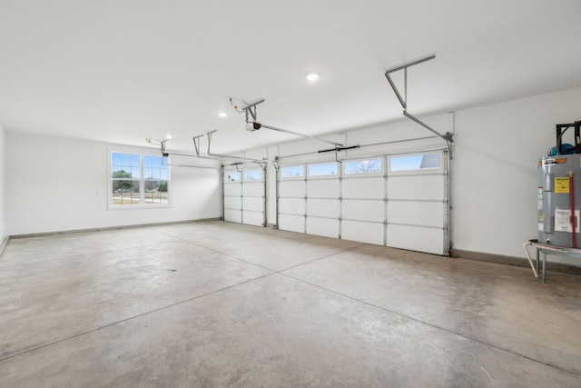 garage featuring a garage door opener and electric water heater