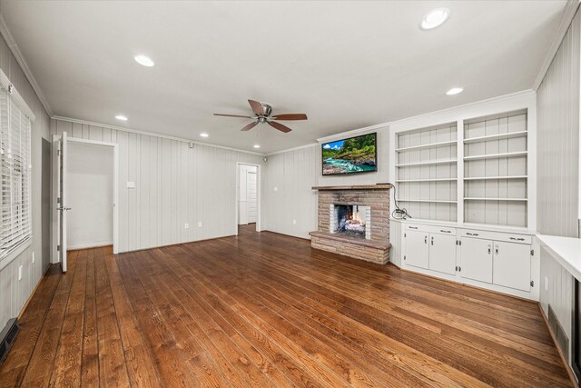 515 E 4th St, Cookeville, TN 38501 - unfurnished living room with ornamental molding, a ceiling fan, a brick fireplace, hardwood / wood-style flooring, and recessed lighting