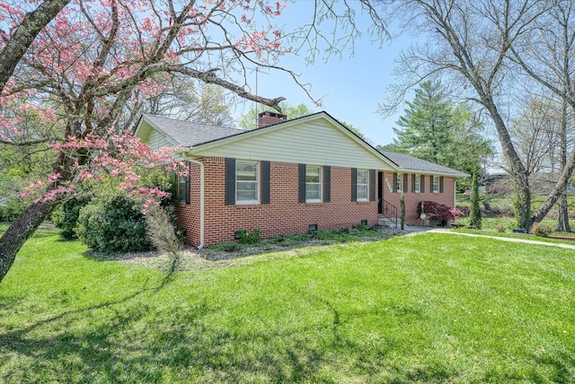 515 E 4th St, Cookeville, TN 38501 - ranch-style home featuring a chimney, brick siding, and a front lawn