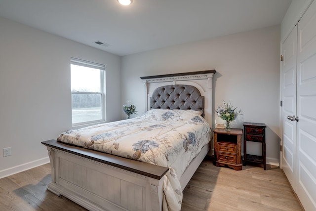 bedroom featuring light wood-type flooring