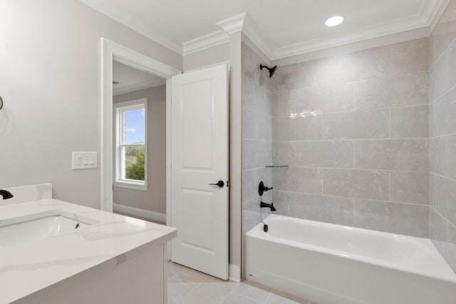 bathroom with vanity, tiled shower / bath combo, and ornamental molding