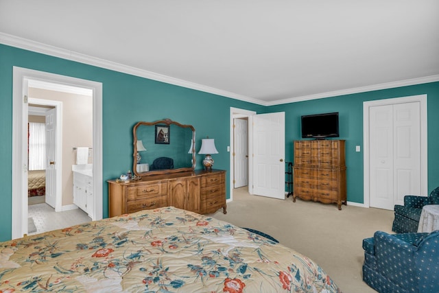 bedroom featuring ornamental molding, a closet, light carpet, and baseboards