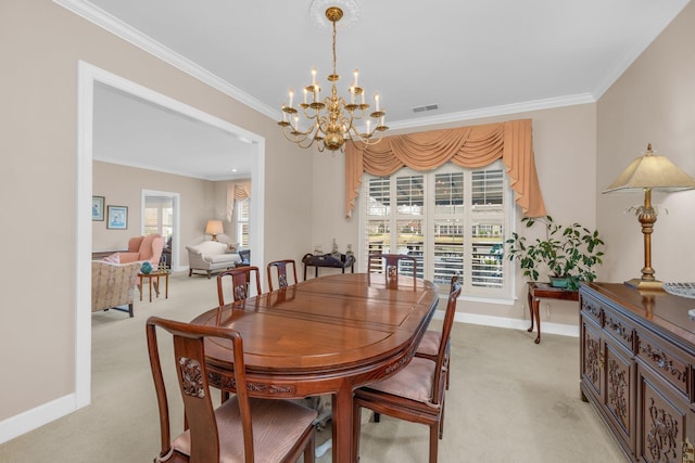 dining space with ornamental molding, visible vents, and light carpet