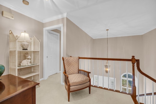 sitting room featuring crown molding and light carpet