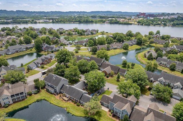 birds eye view of property featuring a residential view and a water view