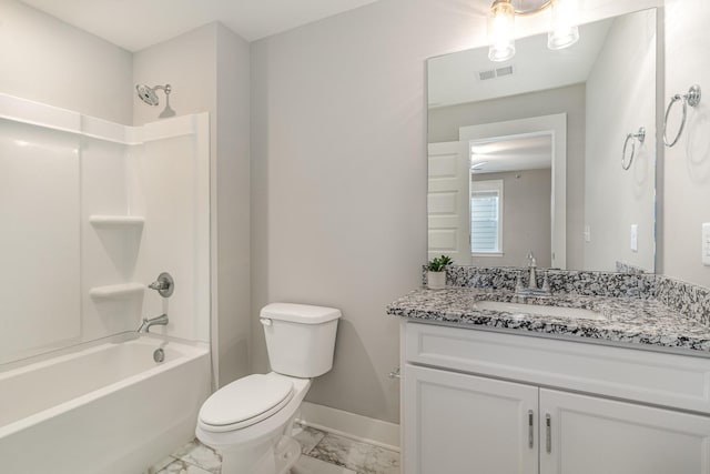 full bathroom featuring vanity, shower / tub combination, and toilet