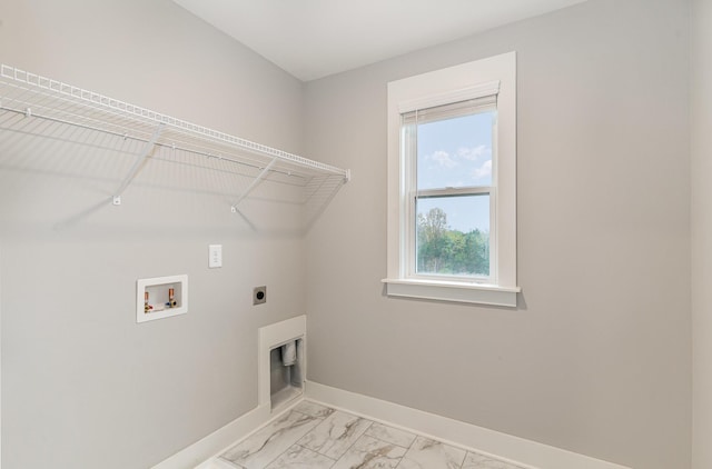 clothes washing area with electric dryer hookup and hookup for a washing machine