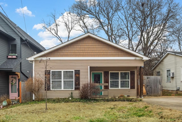 bungalow with a front lawn