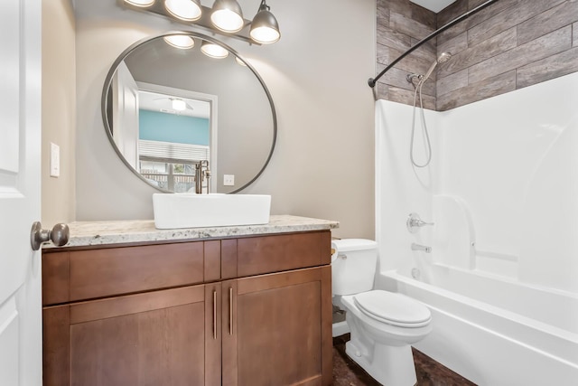 full bathroom featuring vanity, toilet, and shower / bathing tub combination