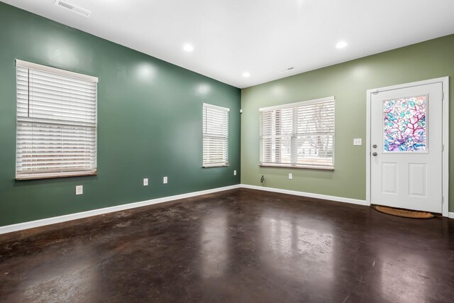 entryway with concrete floors