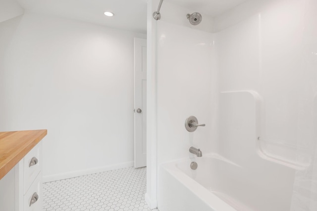 bathroom featuring  shower combination