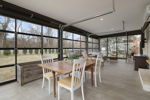 sunroom / solarium with a wall unit AC