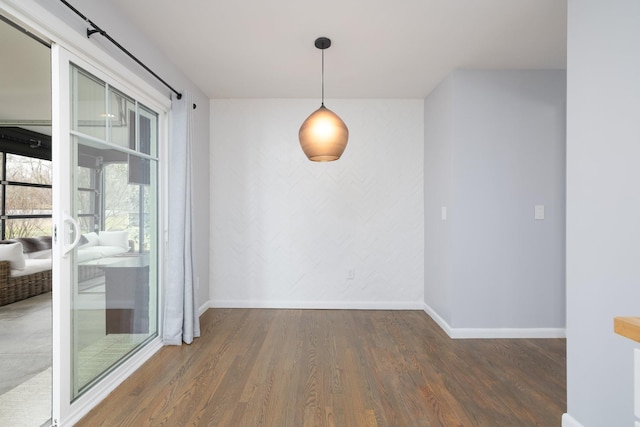 unfurnished room featuring dark wood-type flooring