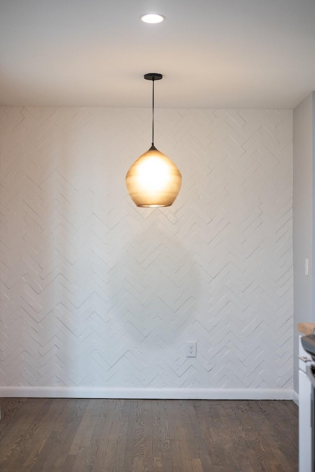 interior details featuring hardwood / wood-style flooring