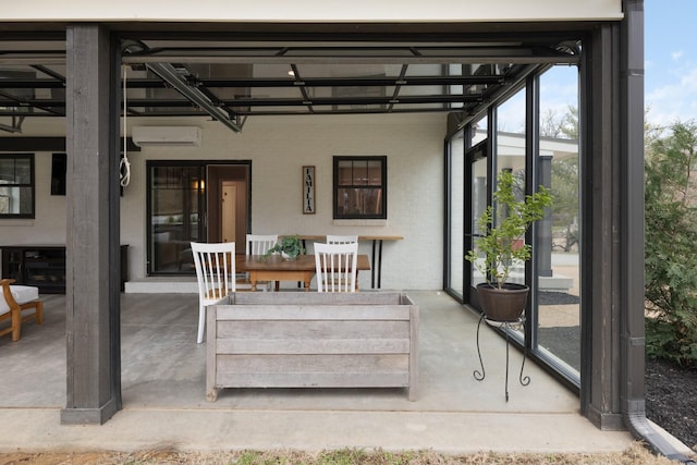 sunroom / solarium with a wall mounted air conditioner