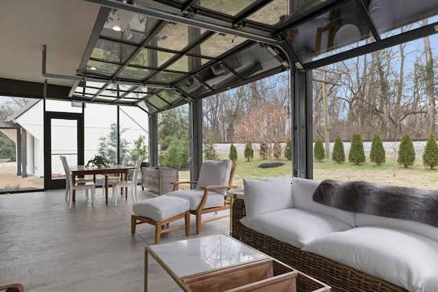 sunroom featuring a healthy amount of sunlight