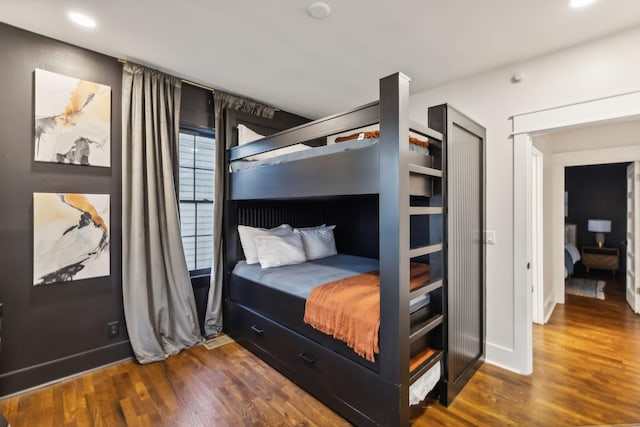 bedroom featuring dark hardwood / wood-style floors