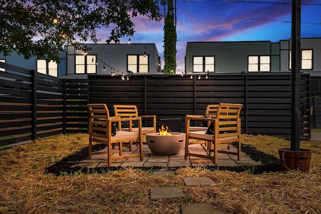 exterior space featuring an outdoor fire pit