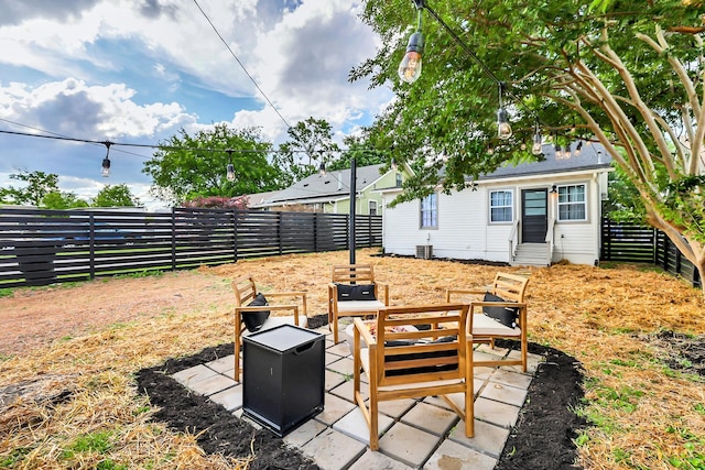 view of patio / terrace featuring a fire pit