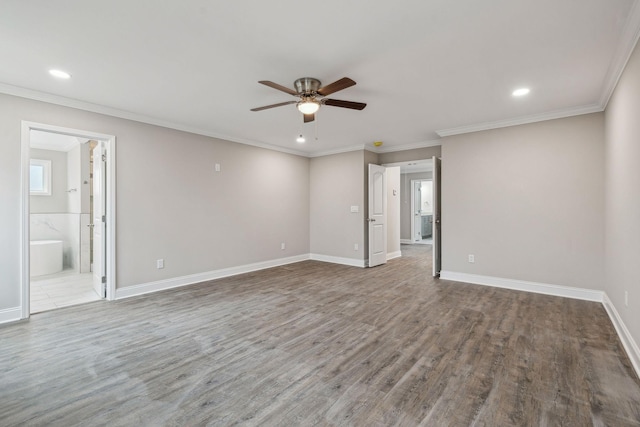 unfurnished room with hardwood / wood-style flooring, ornamental molding, and ceiling fan