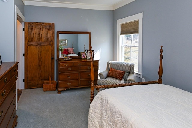 bedroom with dark colored carpet and crown molding