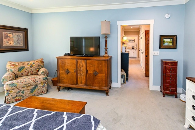 living room featuring ornamental molding and light colored carpet