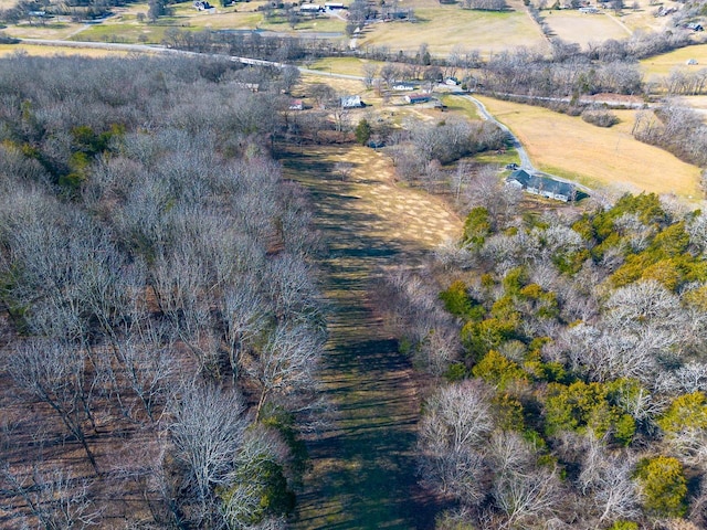 birds eye view of property featuring a rural view