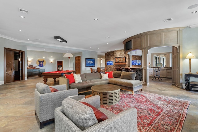 living room with crown molding and pool table