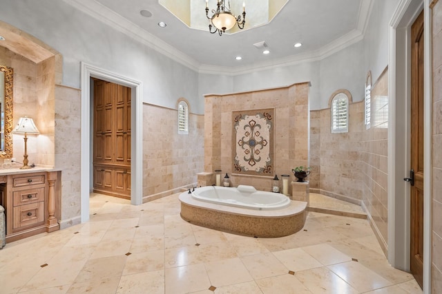 bathroom with independent shower and bath, tile walls, ornamental molding, vanity, and a notable chandelier