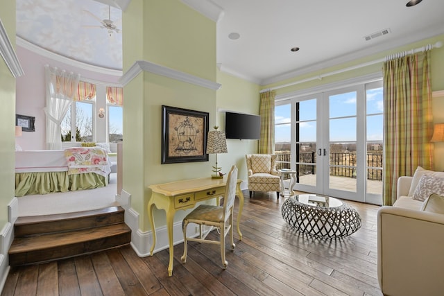 bedroom with crown molding, wood-type flooring, access to exterior, and french doors