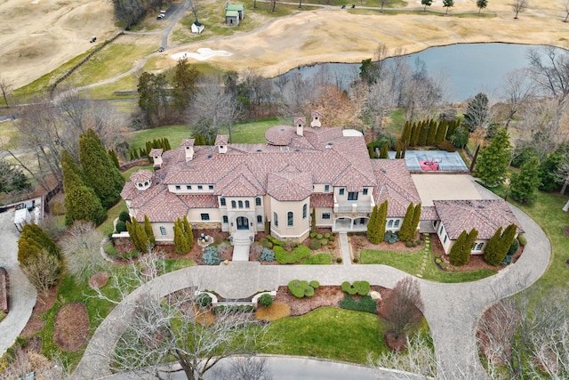 drone / aerial view featuring a water view